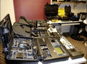 a table with a variety of electronics