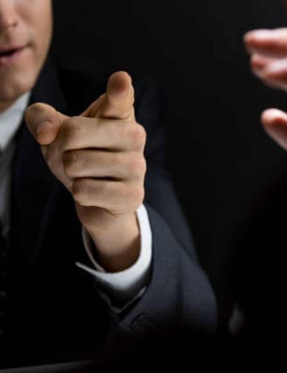 man pointing Hire Detective to Find Someone